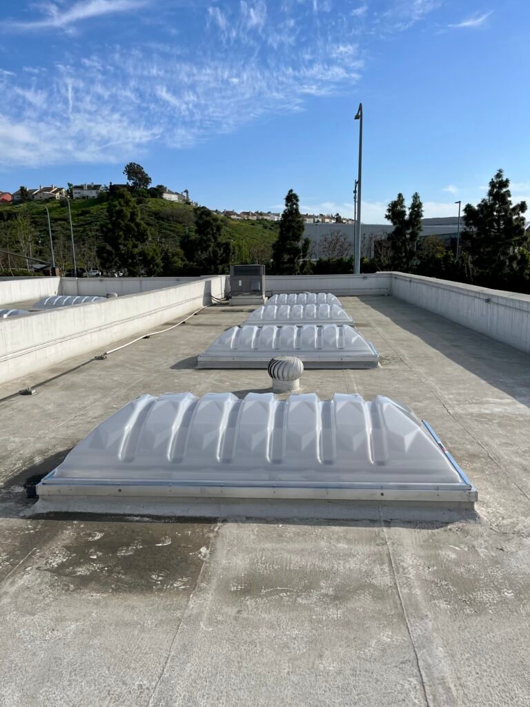 Commercial 4x8 polycarbonate dome skylights installed on a Culver City building — Hollywood Skylights