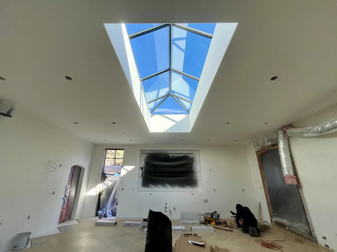Double pitch with hipped ends skylight interior, Los Angeles
