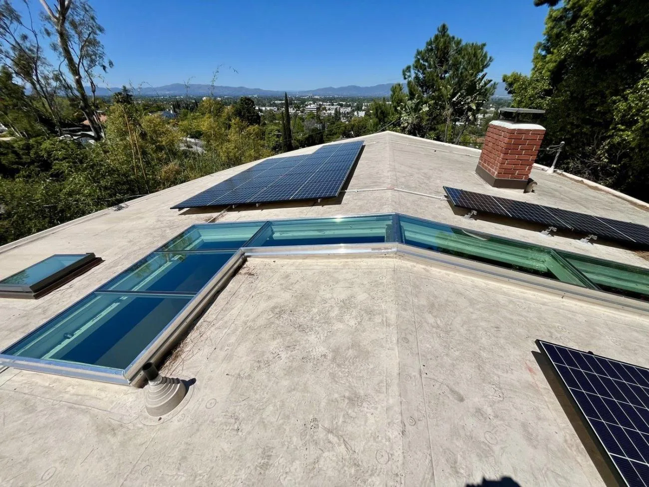 Custom ridge skylight with horizontal section, Los Angeles